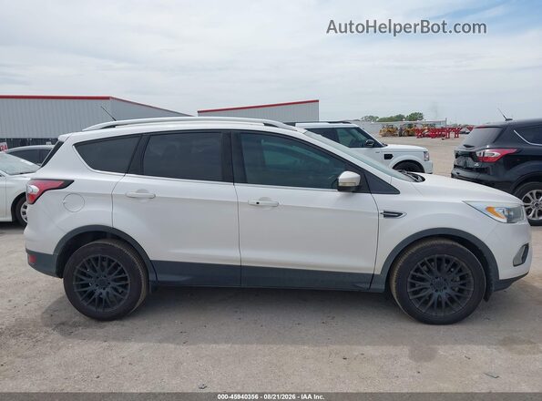 1FMCU0J90HUD40098 2017 FORD ESCAPE White Rear interior view