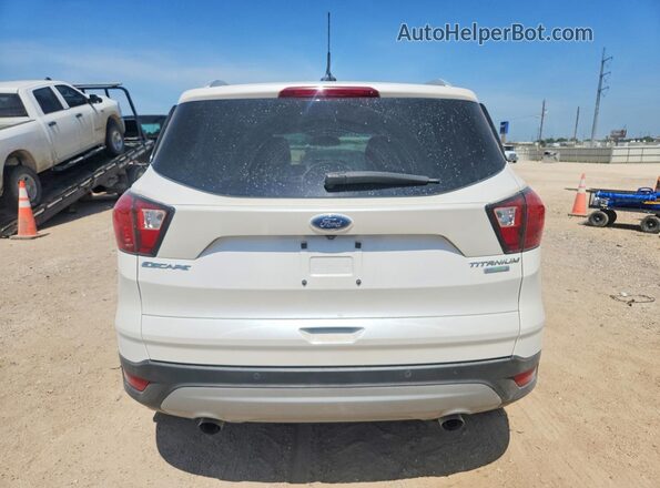1FMCU0J90KUB26509 2019 FORD ESCAPE White Vista trasera