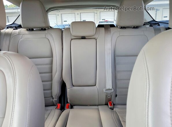 1FMCU0J92HUD07586 2017 FORD ESCAPE Tan Vista de los asientos traseros