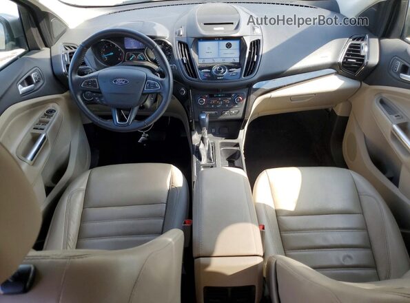 1FMCU0J92HUD07586 2017 FORD ESCAPE Tan Vista del salpicadero