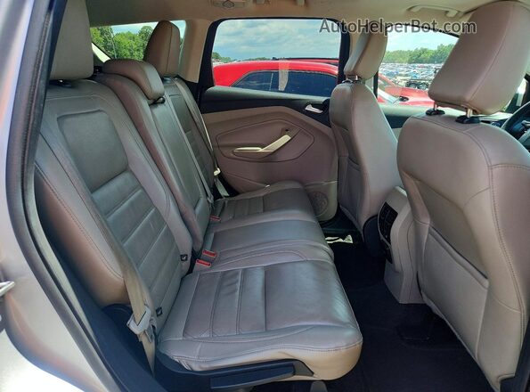 1FMCU0J96JUB16758 2018 FORD ESCAPE Silver Widok wnętrza z tyłu