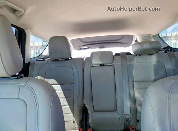 1FMCU0J96JUB62347 2018 FORD ESCAPE Silver Rear seats view