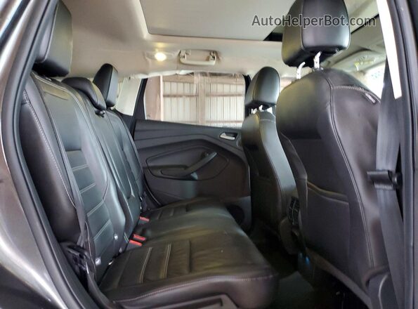 1FMCU0J99HUB42703 2017 FORD ESCAPE Gray Widok wnętrza z tyłu