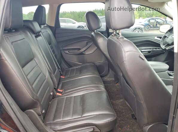 1FMCU0JD2HUA75513 2017 FORD ESCAPE Black Rear seats view