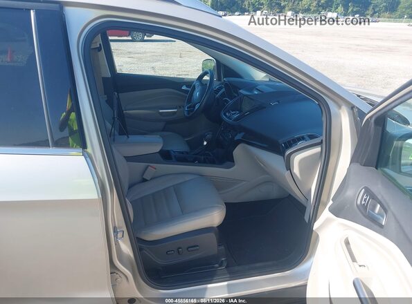 1FMCU0JD2HUC98487 2017 FORD ESCAPE Gold წინა სალონის ხედი