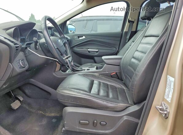 1FMCU0JD8HUC64358 2017 FORD ESCAPE Gold Front interior view