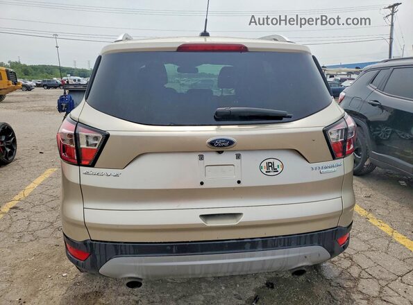 1FMCU0JD8HUC64358 2017 FORD ESCAPE Gold Rear view