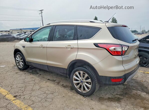 1FMCU0JD8HUC64358 2017 FORD ESCAPE Gold Rear left