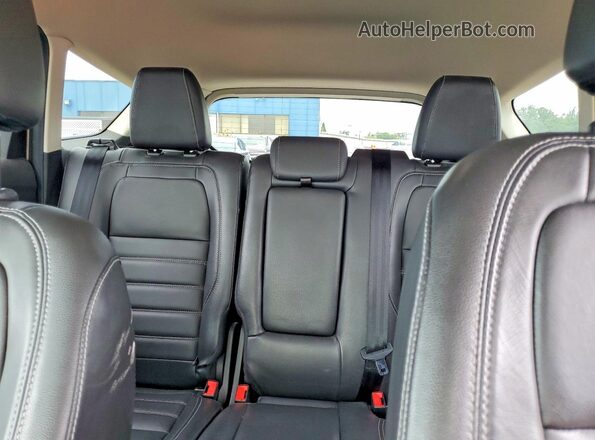 1FMCU0JD8HUC64358 2017 FORD ESCAPE Gold Rear seats view