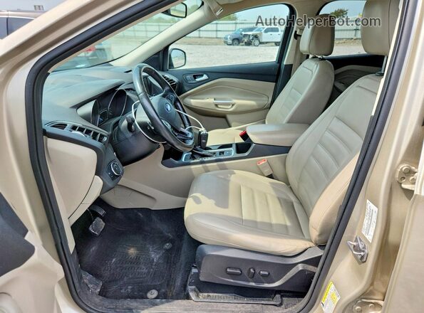 1FMCU0JD9HUD10957 2017 FORD ESCAPE Tan Вид салону спереду