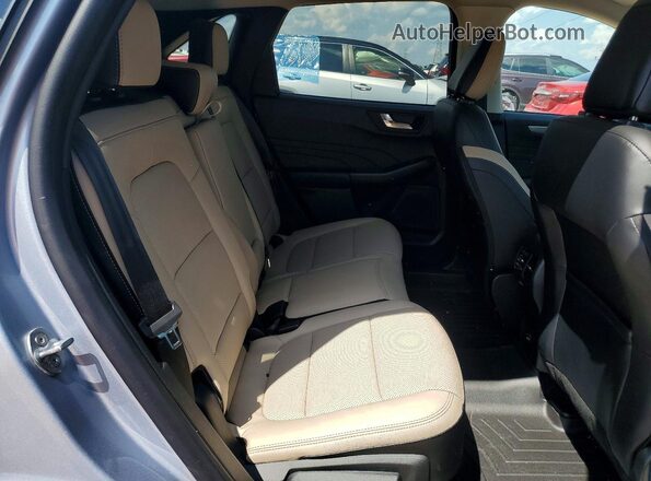 1FMCU0LZ1NUA29062 2022 FORD ESCAPE Silver Widok wnętrza z tyłu