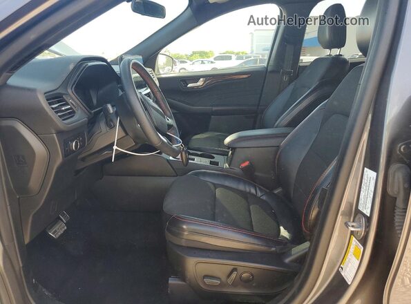 1FMCU0MN9PUA90772 2023 FORD ESCAPE Серый Вид салона спереди