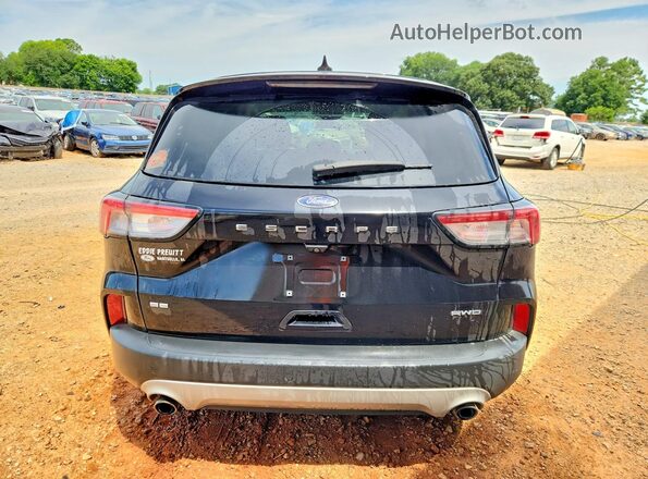 1FMCU9G68MUB24026 2021 FORD ESCAPE Black Rear view