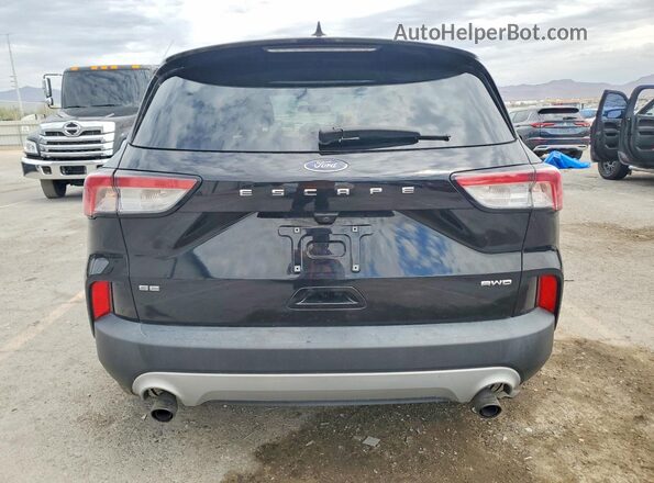 1FMCU9G69MUB22656 2021 FORD ESCAPE Черный Вид сзади