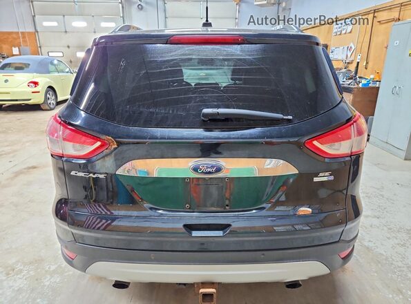 1FMCU9G90GUA36733 2016 FORD ESCAPE Black Widok z tyłu