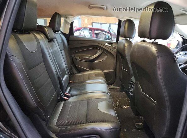 1FMCU9G90GUA36733 2016 FORD ESCAPE Black Widok wnętrza z tyłu