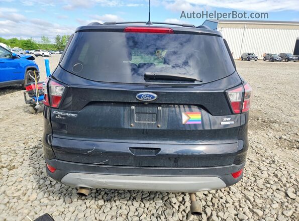 1FMCU9G91HUD71632 2017 FORD ESCAPE Black უკანა ხედი