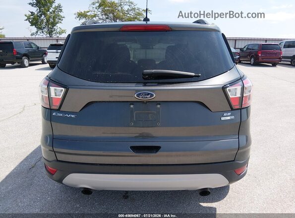 1FMCU9GD0JUD31178 2018 FORD ESCAPE Gray 