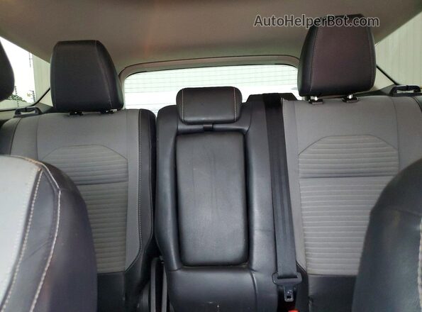1FMCU9GD1JUC17982 2018 FORD ESCAPE White Rear seats view