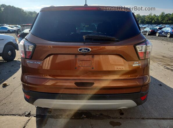1FMCU9GD2HUC17662 2017 FORD ESCAPE Brown Rear view