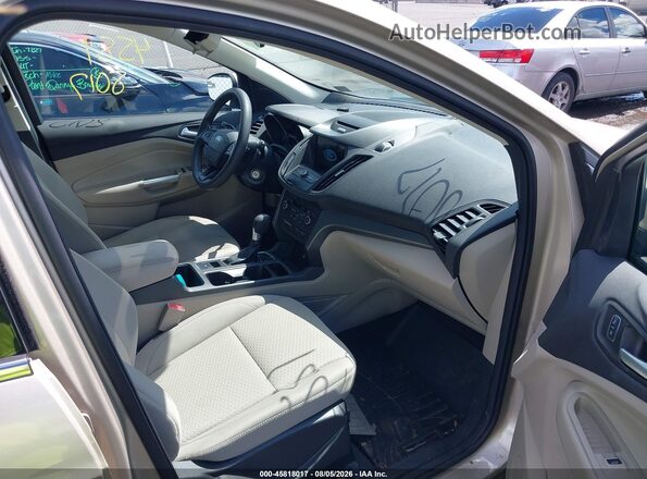 1FMCU9GD2HUC19623 2017 FORD ESCAPE Gold Front interior view