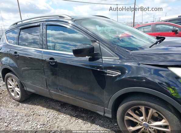 1FMCU9GD3JUA32039 2018 FORD ESCAPE Black Rear interior view