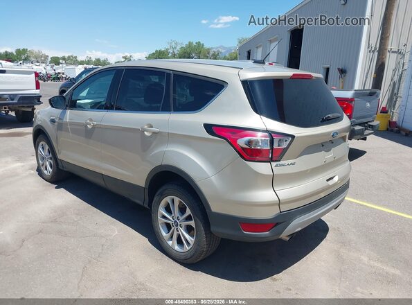 1FMCU9GD4HUE18513 2017 FORD ESCAPE Gold Rear left