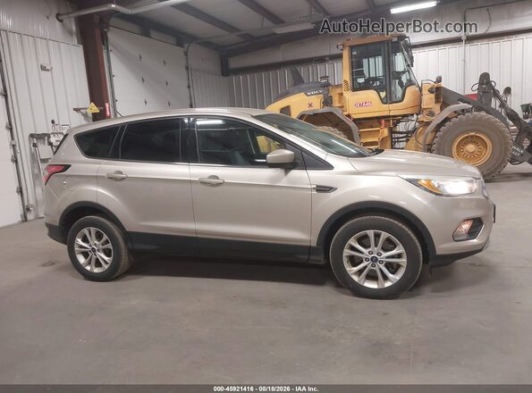 1FMCU9GD6HUA30196 2017 FORD ESCAPE Beige Widok wnętrza z tyłu