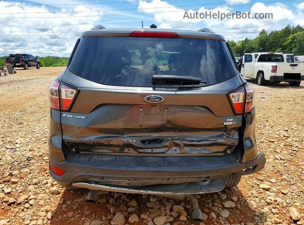 1FMCU9GD6JUA17776 2018 FORD ESCAPE Gray Rear view