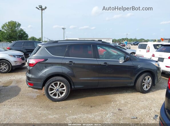 1FMCU9GD6JUC90636 2018 FORD ESCAPE Gray Vista interior trasera