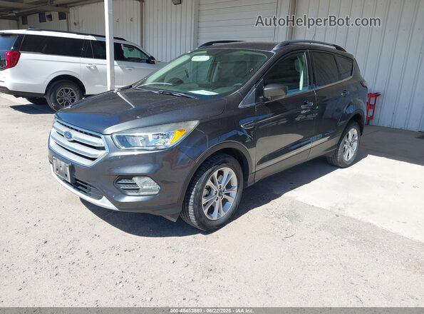 1FMCU9GD6JUD31038 2018 FORD ESCAPE Gray Vista tres cuartos delantera izquierda