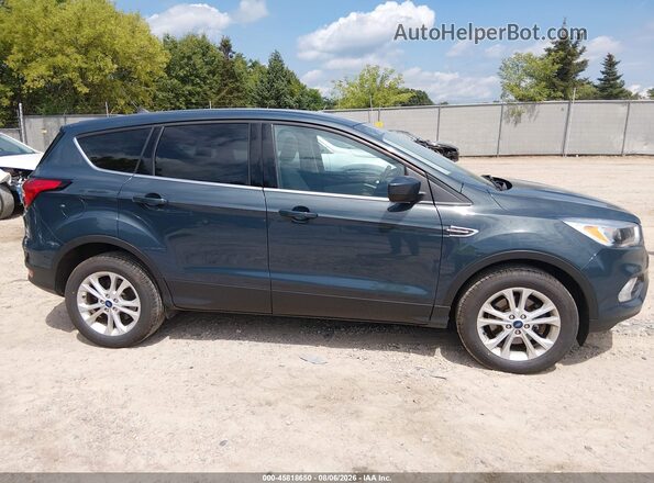 1FMCU9GD6KUB11321 2019 FORD ESCAPE Teal Vista interior trasera