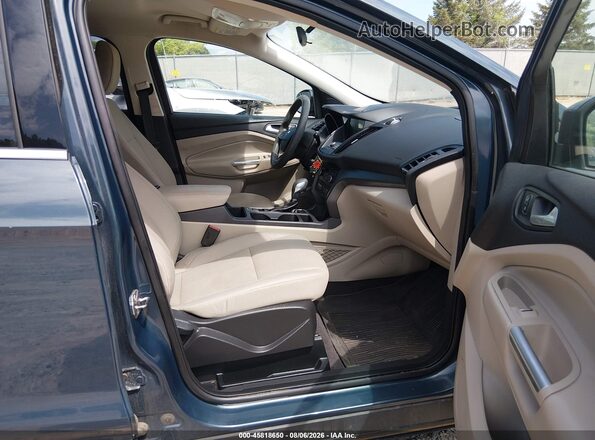 1FMCU9GD6KUB11321 2019 FORD ESCAPE Teal Vista interior delantera