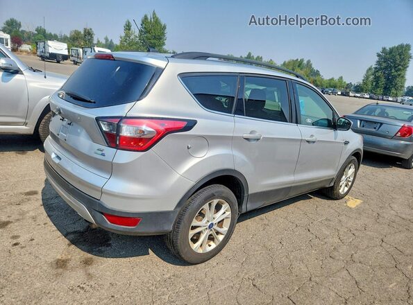 1FMCU9GD7JUC60948 2018 FORD ESCAPE Silver Trasero derecho