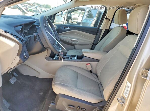 1FMCU9GD8HUE34066 2017 FORD ESCAPE Gold Front interior view