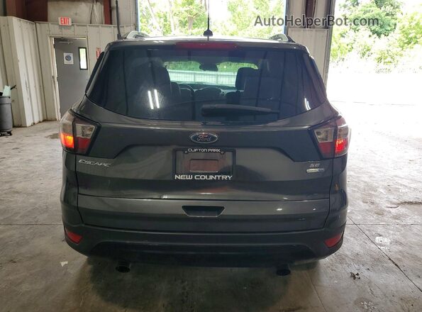 1FMCU9GD8JUB92854 2018 FORD ESCAPE Gray Vista trasera