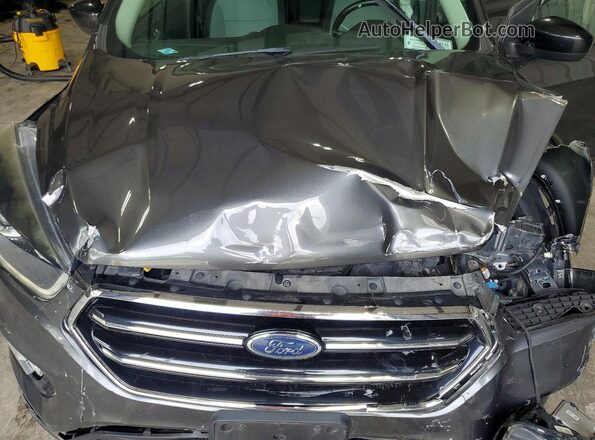 1FMCU9GD8JUB92854 2018 FORD ESCAPE Gray Vista interior trasera