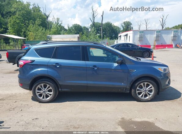 1FMCU9GD9JUB98002 2018 FORD ESCAPE Blue Widok wnętrza z tyłu
