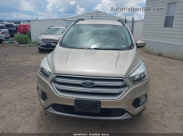1FMCU9GD9JUD08899 2018 FORD ESCAPE Gold Rear interior view