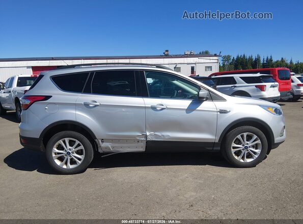 1FMCU9GDXJUD08524 2018 FORD ESCAPE Silver Widok wnętrza z tyłu