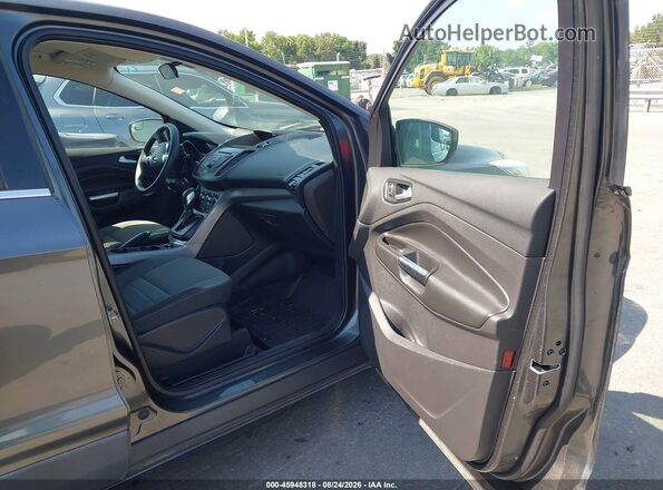 1FMCU9GX9GUB92686 2016 FORD ESCAPE Gray Вид салону спереду
