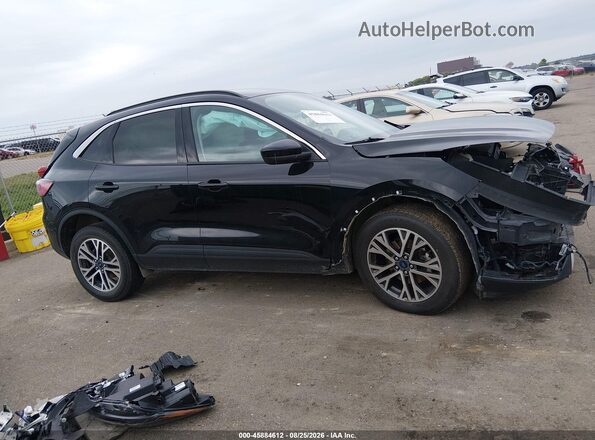 1FMCU9H63MUB06225 2021 FORD ESCAPE Черный Вид задней части салона
