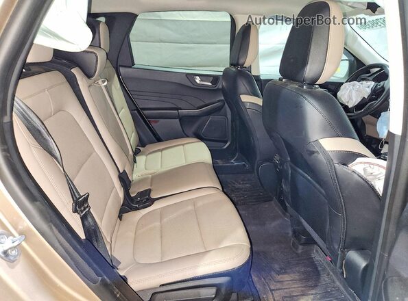 1FMCU9H65MUB35676 2021 FORD ESCAPE Желто-коричневый Вид задней части салона