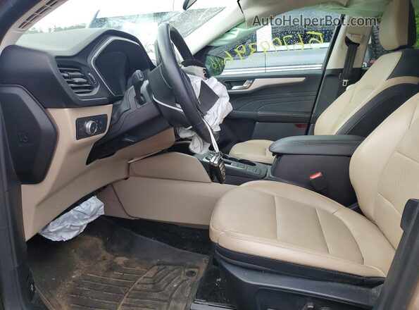 1FMCU9H65MUB35676 2021 FORD ESCAPE Желто-коричневый Вид салона спереди