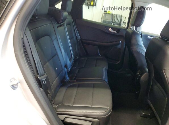 1FMCU9H90LUC68337 2020 FORD ESCAPE Серебряный Вид задней части салона