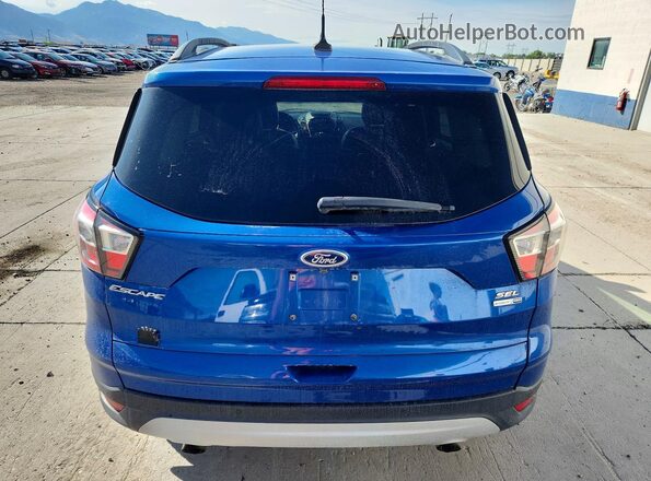1FMCU9HD1JUD15439 2018 FORD ESCAPE Blue Rear view