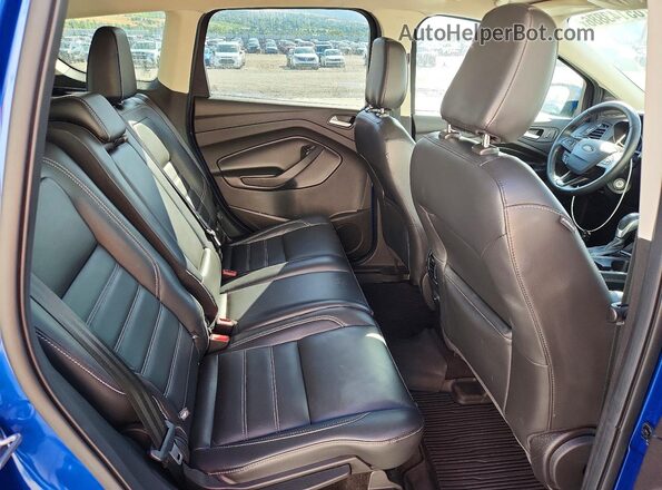 1FMCU9HD1JUD15439 2018 FORD ESCAPE Blue Rear seats view