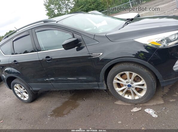1FMCU9HD4JUA14454 2018 FORD ESCAPE Black Vista interior trasera