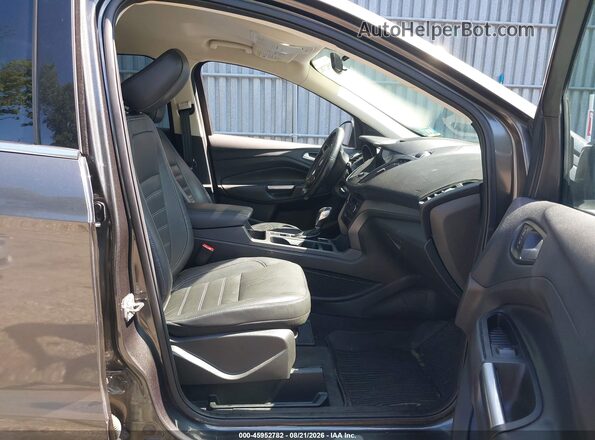 1FMCU9HD4JUB93742 2018 FORD ESCAPE Gray Front interior view
