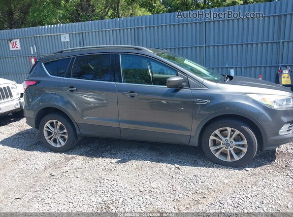 1FMCU9HD4JUB93742 2018 FORD ESCAPE Gray Rear interior view